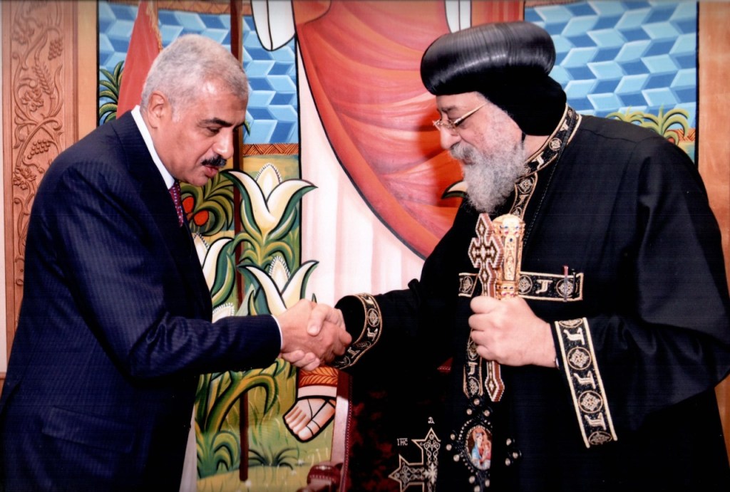 Hesham Talaat Moustafa with Pope Tawadros II 